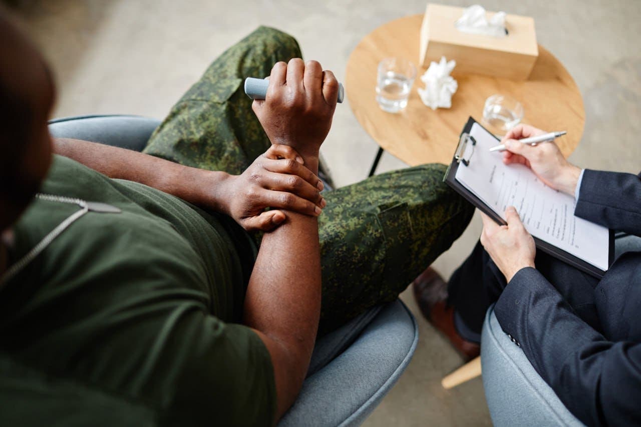 Healthcare professional consulting with patient about treatment plan